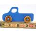 unHandmade wooden toy pickup truck painted in baby blue with metallic sapphire blue trim. The truck features non-marring amber shellac wheels and is part of my Play Pal Collection. A close-up shot of the toy truck on a white background. Made to Order.defined